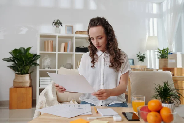 Manager Checking Documents with Interface Layout — Photo