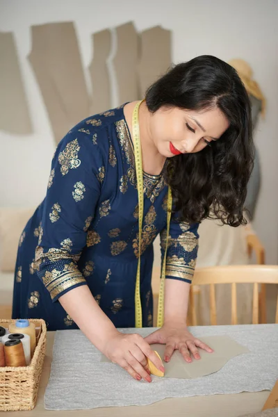 Dressmaker Marking out Sewing Pattern —  Fotos de Stock