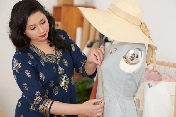 Seamstress Measuring Dress on Mannequin — Foto de Stock