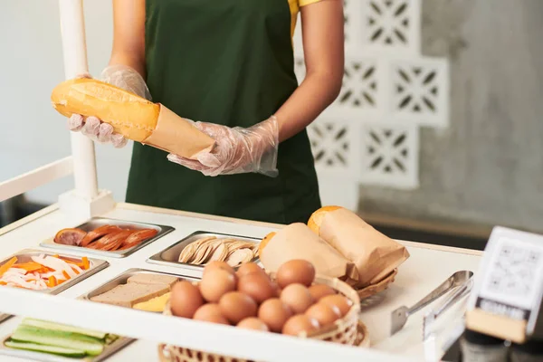 Cook Packing Sandwiches — Stock Photo, Image