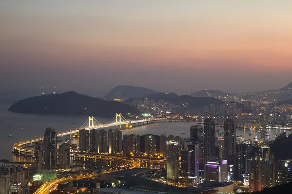 Busan city skyline at sunset — Stock Photo, Image