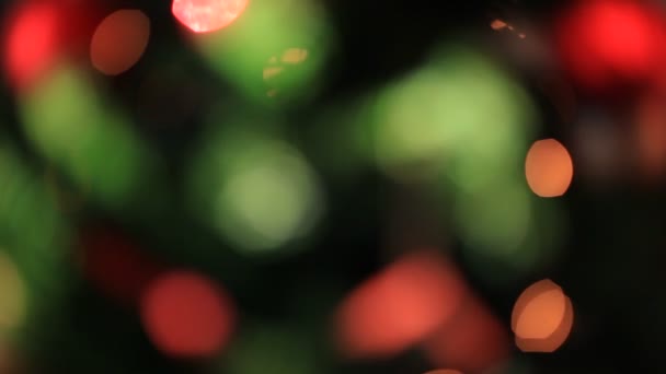 Colored lights effects, Christmas tree background — Stock Video