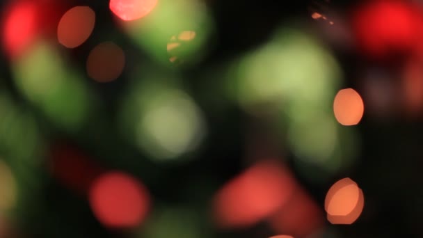 Colored lights effects, Christmas tree background — Stock Video