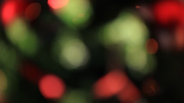 Colored lights effects, Christmas tree background — Stock Video