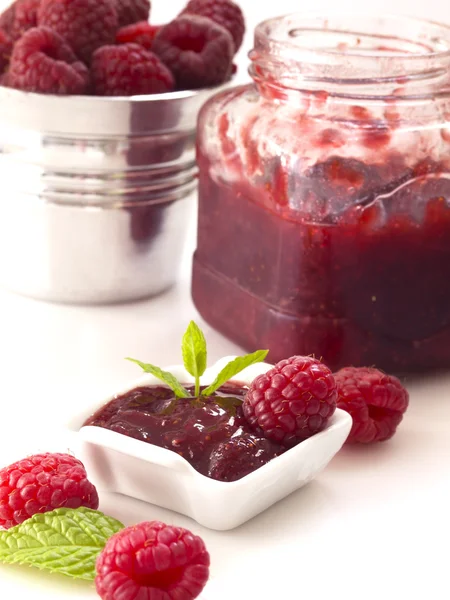 Raspberries and jam — Stock Photo, Image