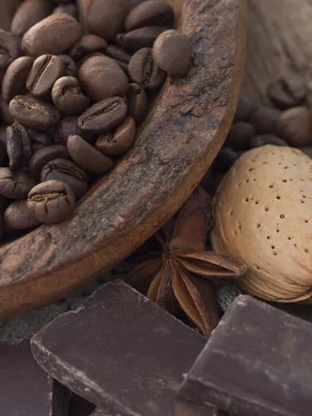 Coffee beans with almonds and chocolate — Stock Photo, Image
