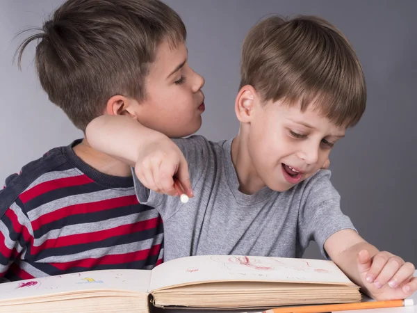 Brothers as pupils — Stock Photo, Image