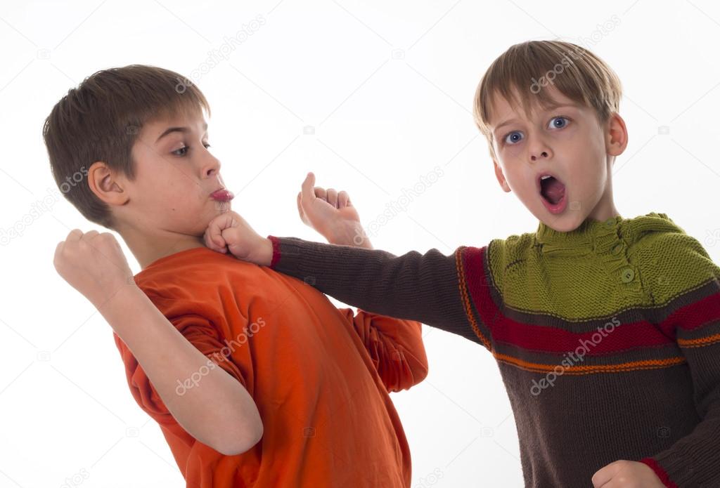 fight fighting boys Stock Photo - Alamy