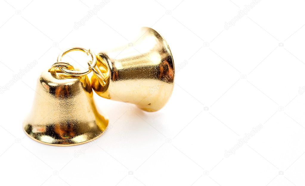 Golden bell on white background