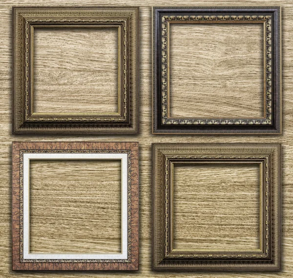 Antique frame on wood background — Stock Photo, Image