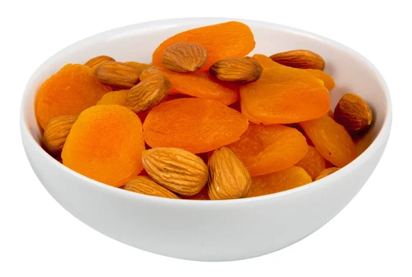 Mixed almonds and dried apricots — Stock Photo, Image