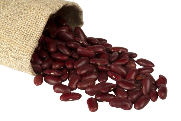 Red beans in a bag isolated on white — Stock Photo, Image