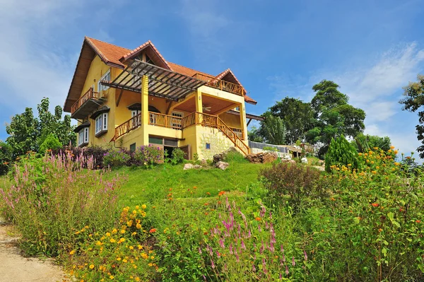 Yellow classic house on hill, pai, maehongson, thailand