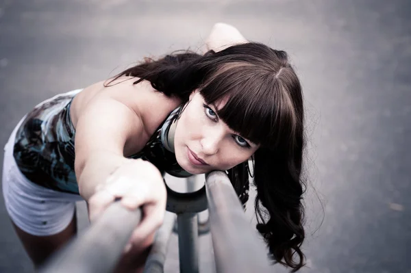 Beautiful woman on the rails — Stock Photo, Image