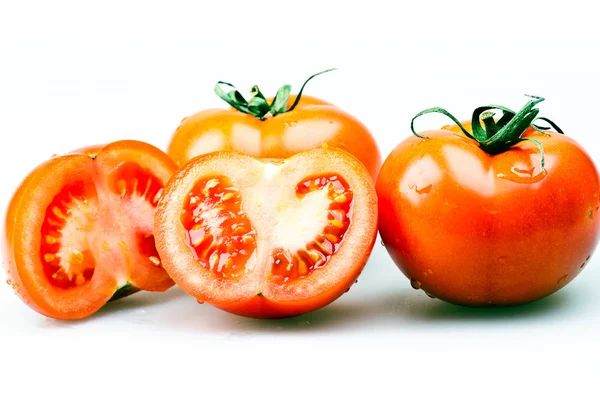 Grupo de tomates isolados em branco — Fotografia de Stock