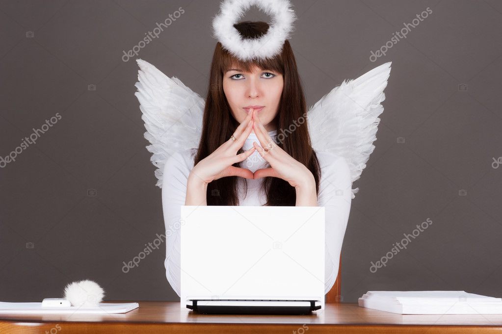 angel sitting at the computer