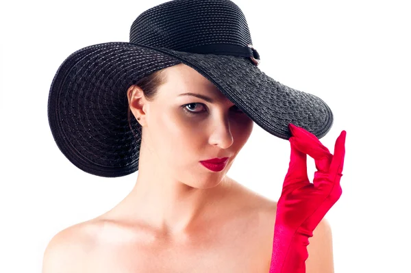 Elegant woman in a hat — Stok fotoğraf