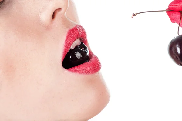 Woman with cherry in mouth — Stock Photo, Image