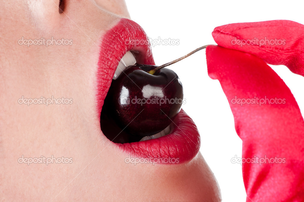 Woman eating cherries