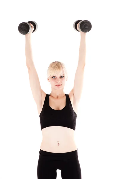 Woman is engaged with dumbbells — Stock Photo, Image