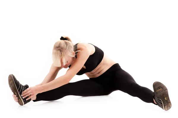 Beautiful woman doing stretching — Stock Photo, Image