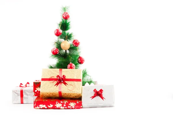 Christmas tree and gifts — Stock Photo, Image