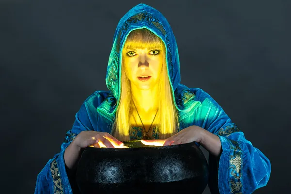 Witch with cauldron — Stock Photo, Image
