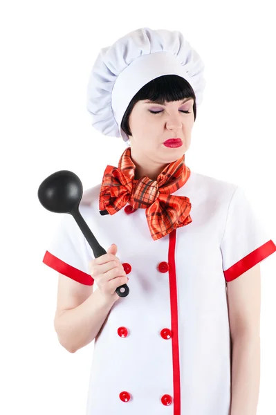 Unhappy chef with a ladle in hand — Stock Photo, Image