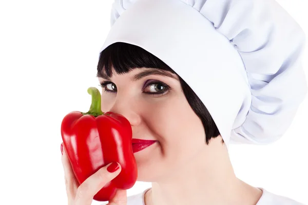 Chef smelling red pepper — Stock Photo, Image