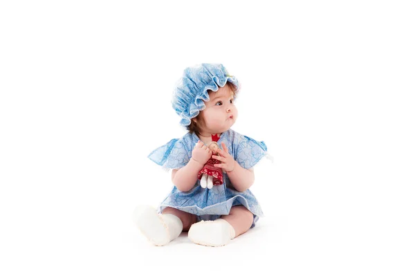 Menina bebê em um vestido azul — Fotografia de Stock