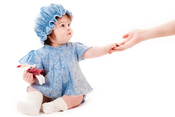 Baby girl reaches out — Stock Photo, Image