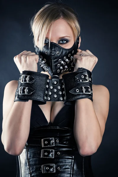 Slave in a mask with spikes — Stock Photo, Image