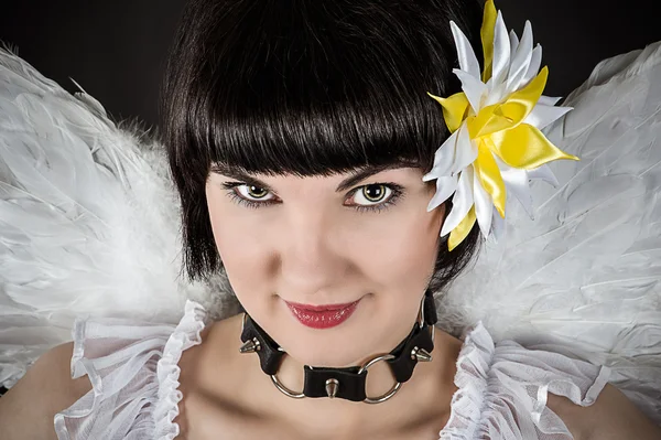 Woman an angel with a collar with spikes — Stock Photo, Image