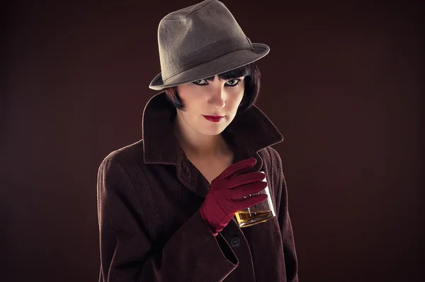 Fashionable woman in the image of the detective — Stock Photo, Image