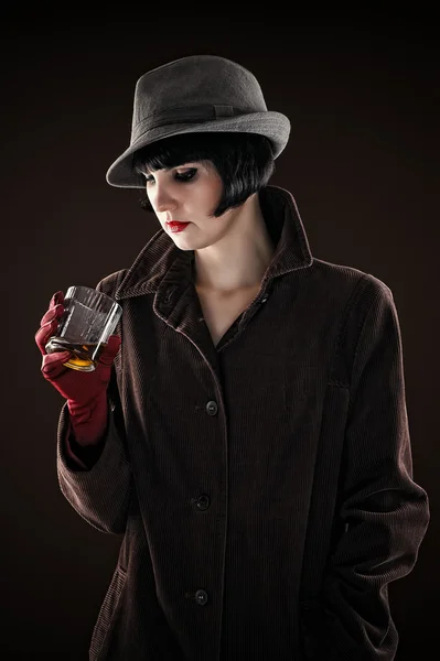 Fashionable woman in the image of the detective — Stock Photo, Image