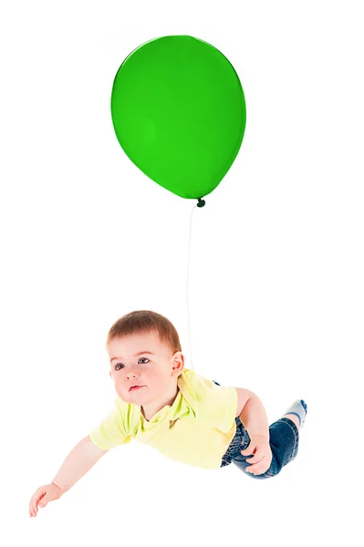 Child flying on a balloon — Stock Photo, Image
