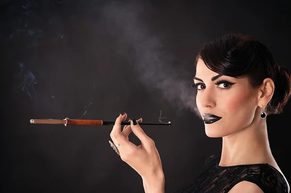 Attractive woman with dark makeup — Stock Photo, Image