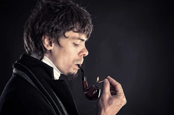 Man smokes tobacco — Stock Photo, Image