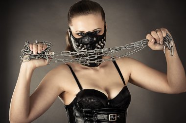 Woman in a mask with a chain clipart