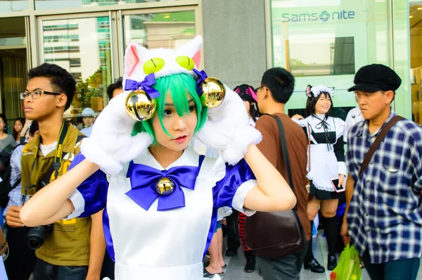 Bangkok - March 30 : An unidentified Japanese anime cosplay pose — Stock Photo, Image