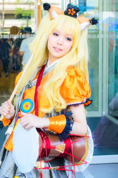 Bangkok - March 30 : An unidentified Japanese anime cosplay pose — Stock Photo, Image