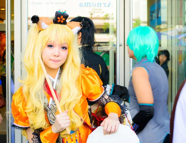 Bangkok - March 30 : An unidentified Japanese anime cosplay pose — Stock Photo, Image