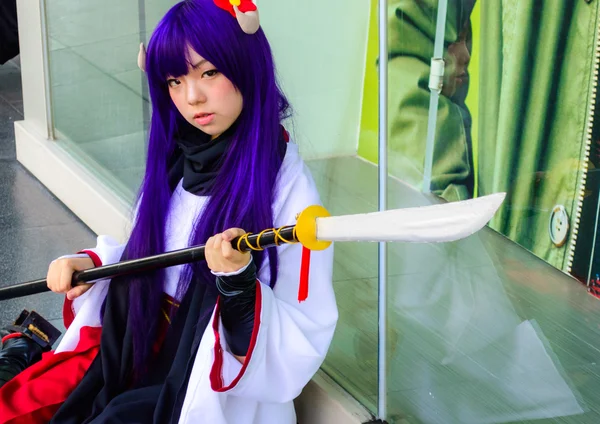 Bangkok - March 30 : An unidentified Japanese anime cosplay pose — Stock Photo, Image