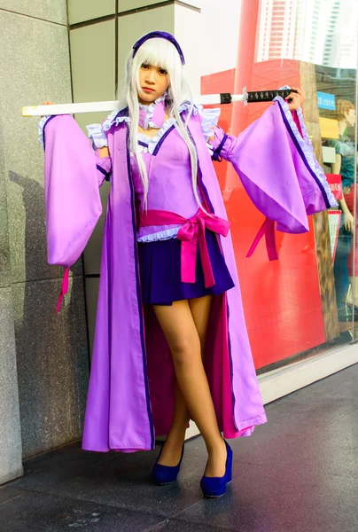 Bangkok - March 30 : An unidentified Japanese anime cosplay pose — Stock Photo, Image