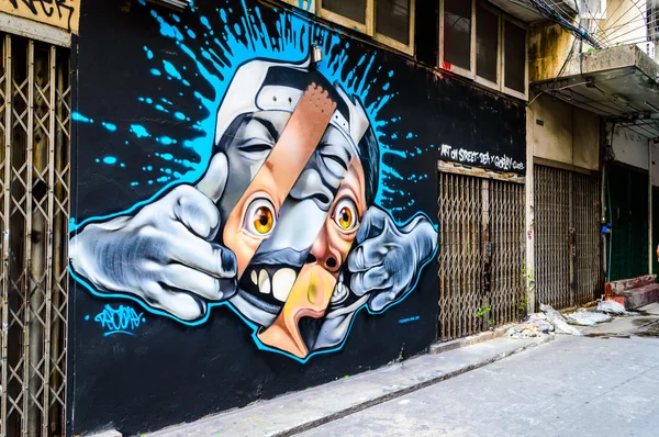 sokak sanatı grafiti yüzündeki duvar biraz burada Bangkok, Tayland