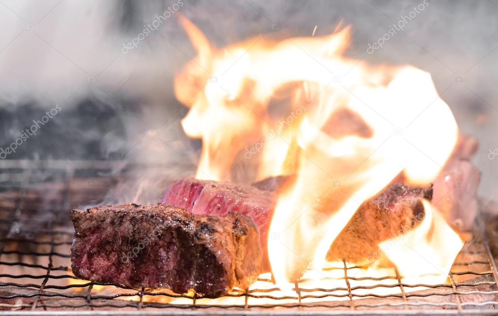 Miyazaki Beef Steak on the Grill with Flames.