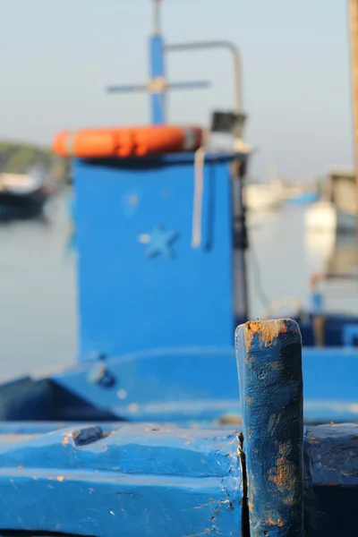 Close up of a docked blue fishing boat — Stock Photo, Image