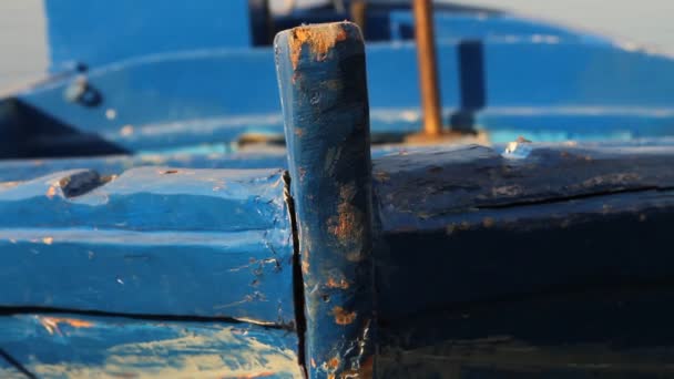 Close up of a docked blue fishing boat — Stock Video