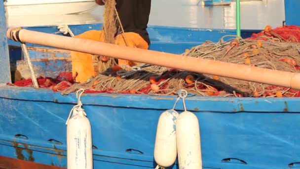 Fishermen working on a boat — Stock Video