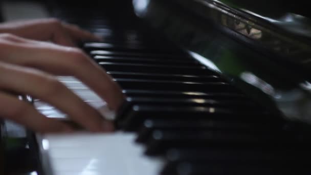 Hands playing piano — Stock Video